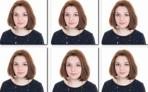 Kobieta w granatowej bluzce z naszyjnikiem. Idealny strój, by wiedzieć, co ubrać na zdjęcie do dowodu.